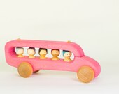 Pink wooden schoolbus, wooden car by Atelier Cheval de bois