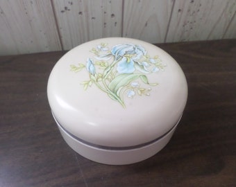 Vintage Avon Beauty Dust empty off white plastic powder container with a blue Iris lid