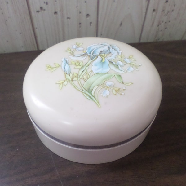 Vintage Avon Beauty Dust empty off white plastic powder container with a blue Iris lid