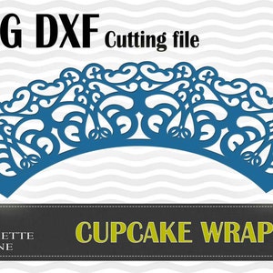 May include: A blue cupcake wrapper with a decorative, intricate design. The wrapper is shaped like a half-circle and has a scalloped edge. The text "SVG DXF Cutting file" and "CUPCAKE WRAPPER" are visible in the image.