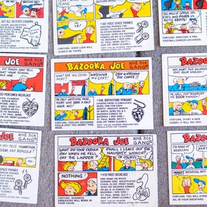 May include: A collection of vintage Bazooka Joe comic cards. Each card features colorful comic strips with the Bazooka Joe character and his gang, along with various offers and fortunes. The cards are rectangular and have a retro aesthetic.