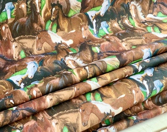 May include: A fabric with a repeating pattern of brown horses running in different directions. The fabric has a green background.