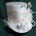 see more listings in the Mini Top Hats section