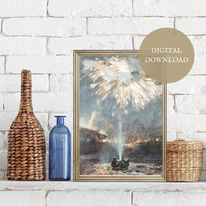 May include: A framed print of a watercolour painting depicting a fireworks display over a body of water. The fireworks are white and gold, and the water is a dark blue. The painting is in a gold frame and is hanging on a white brick wall.