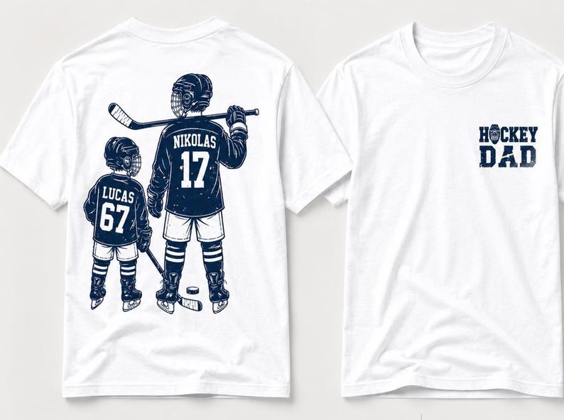 May include: White t-shirts with a hockey theme. One shirt features a graphic of two hockey players with the names "Nikolas" and "Lucas" and the numbers "17" and "67". The other shirt has the text "HOCKEY DAD".