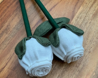 Single ivory linen rose