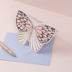 Carte de vœux de moth de papier dor illustré image 1