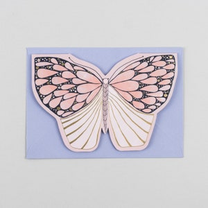 Carte de vœux de moth de papier dor illustré image 2