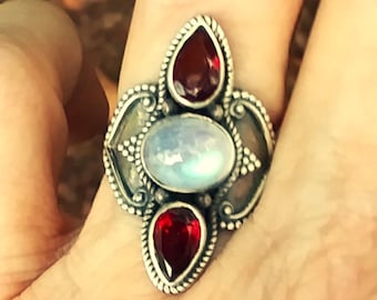 Garnet and moonstone ring in a size 6 1/2 in oxidized sterling silver