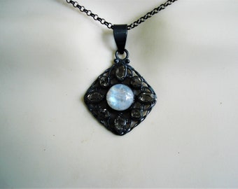 Rainbow moonstone and herkimer quartz darkly oxidized 925 sterling silver pendant
