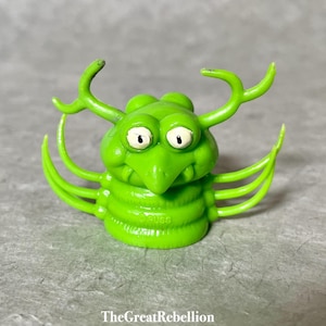 RUSS rubber Monster finger puppet green two faced alien jiggly tentacle creature