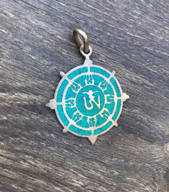 Dharma wheel / Om pendant