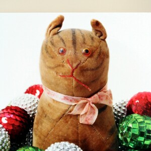 Whimsical photo notecard of a glittery vintage toy cat