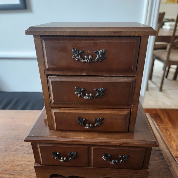 Vintage jewelry box....dark wood...brass hardware..upright