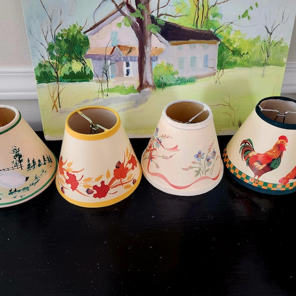 Four little lamp shades...vintage...clip ons...various themes...priced separately