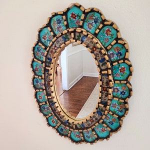 Unique wall mirror....oval shape ...vintage.... eclectic