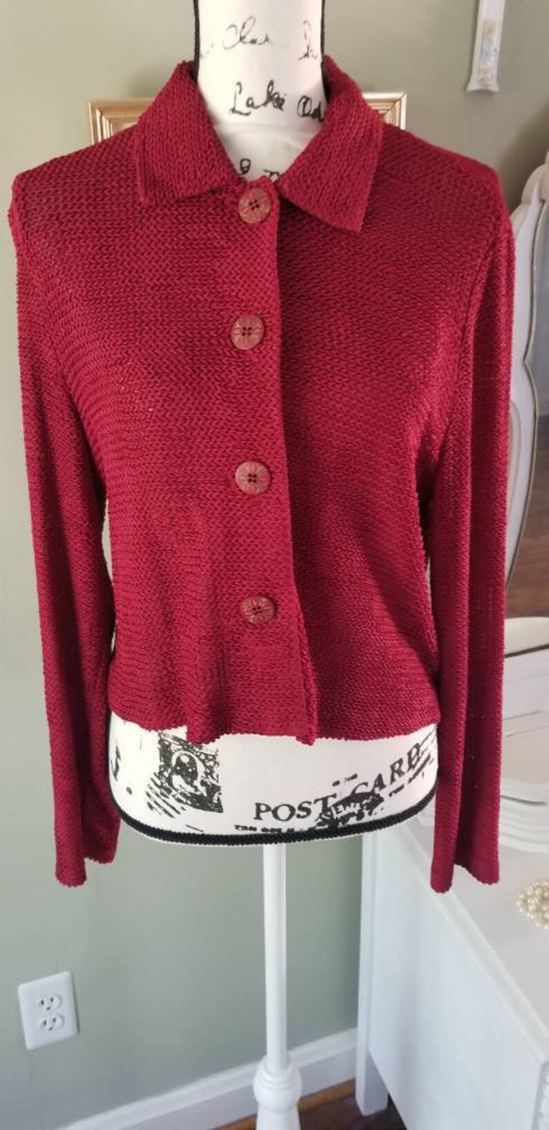 ..cranberry colored...big front buttons...shorter length Jessica Howard vintage cardigan