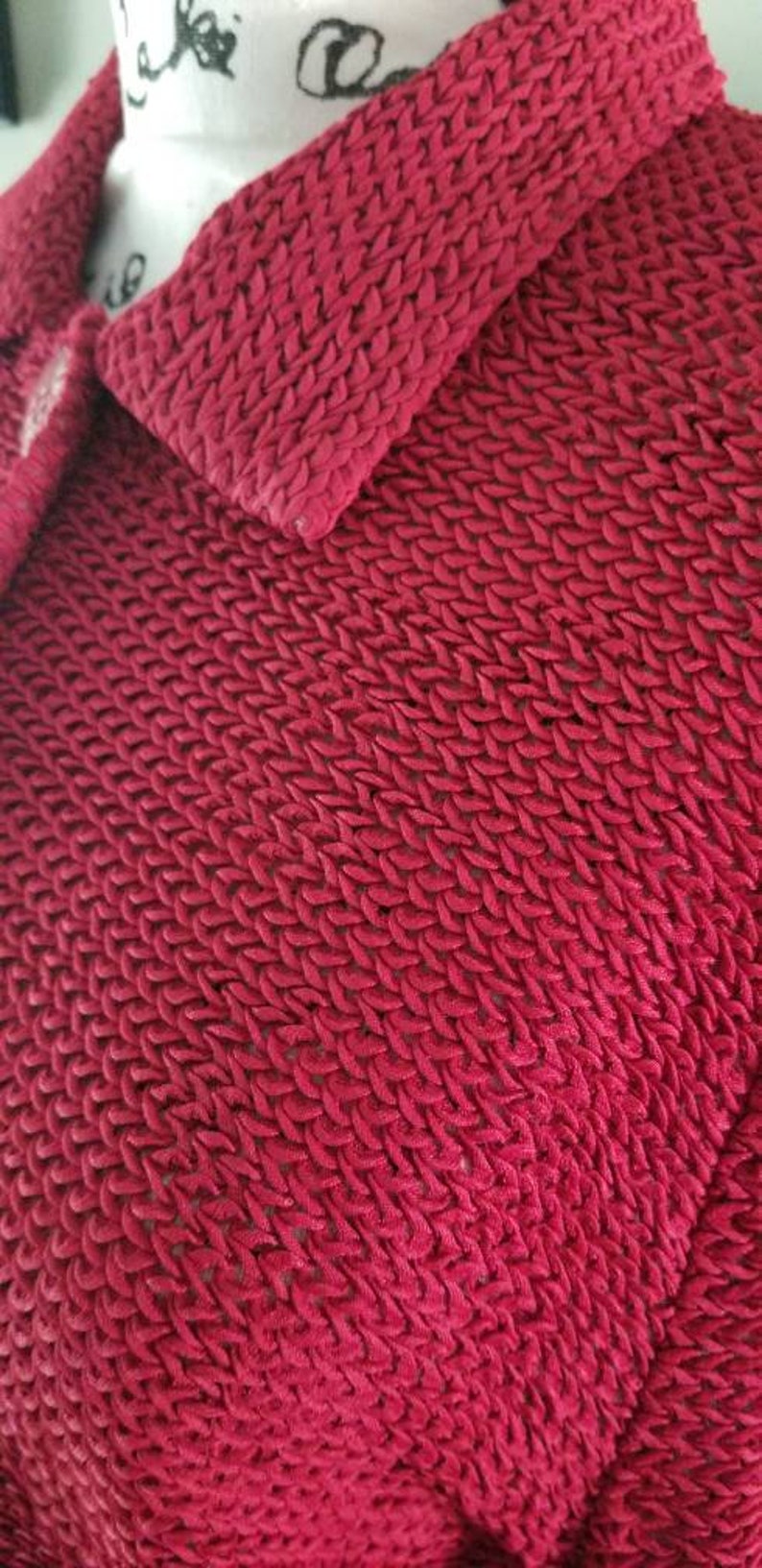 ..cranberry colored...big front buttons...shorter length Jessica Howard vintage cardigan