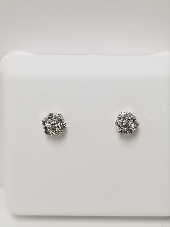 9ct rose gold .25ct diamond studs 9ct rose gold .25ct diamond studs