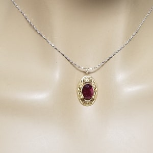 Gem Stone King 4.40 Ct Oval Red Created Ruby Pendant - 18K Yellow Gold Plated Silver