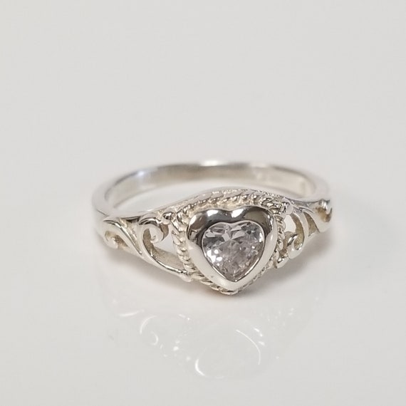 Sterling Silver White Ice .02ct. Diamond Bypass 2-Stone Ring Sterling Silver White Ice .02ct. Diamond Bypass 2-Stone Ring