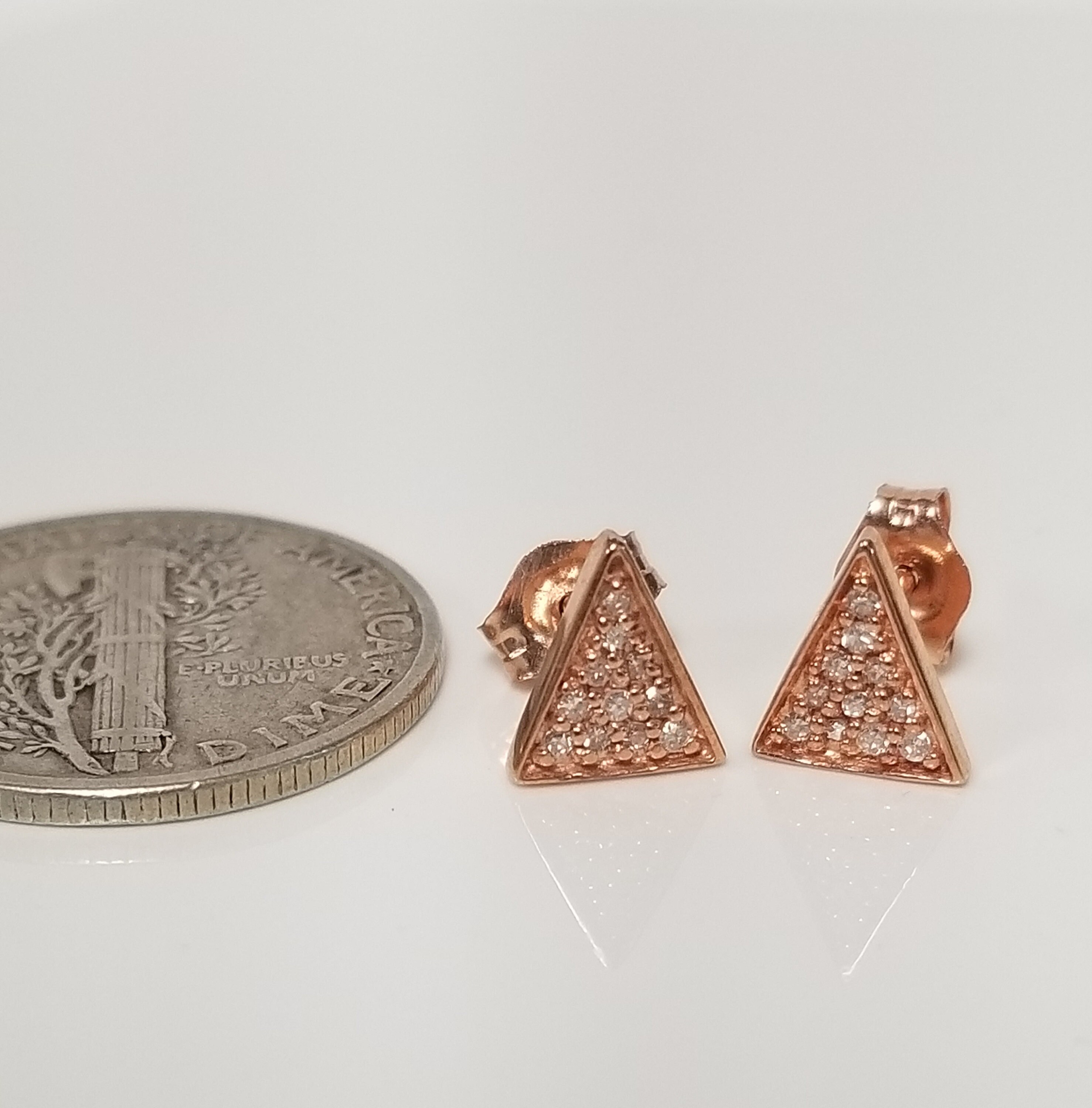 9ct rose .10ct diamond studs 9ct rose .10ct diamond studs