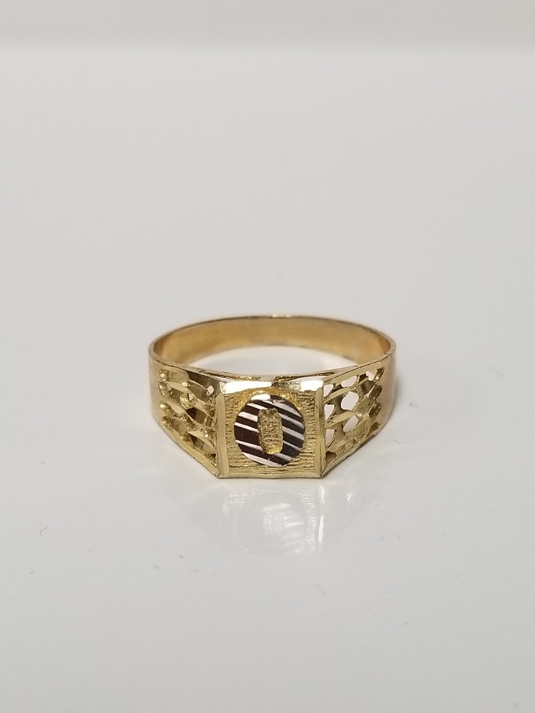 An Early 20th Century Emerald and Diamond Bypass Ring - FD
