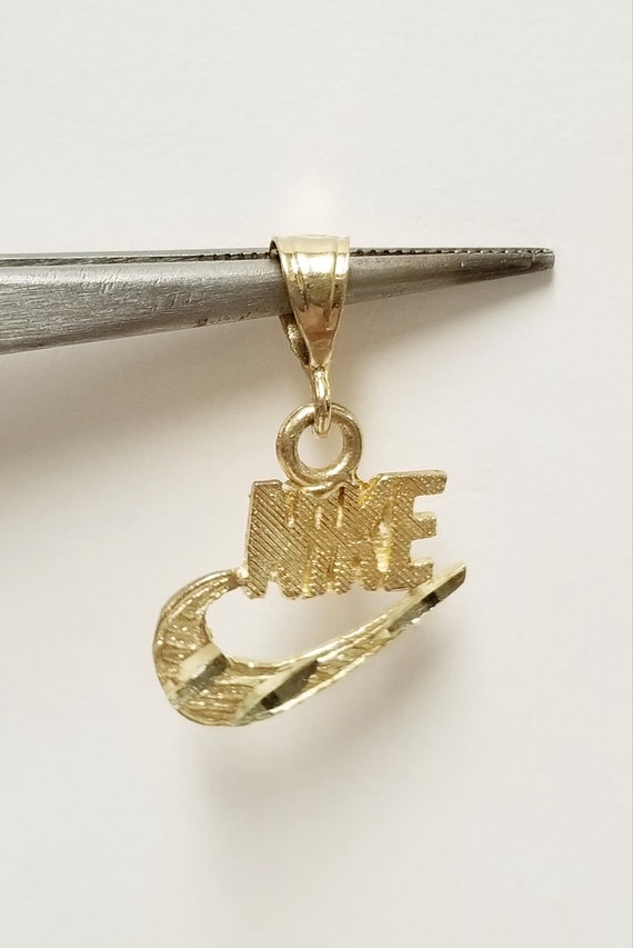 Nike 2024 gold charm