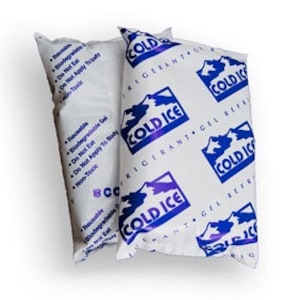 May include: Two white reusable ice packs with blue text and a mountain logo. The text reads "Cold Ice" and "Refrigerant Gel Refresher".
