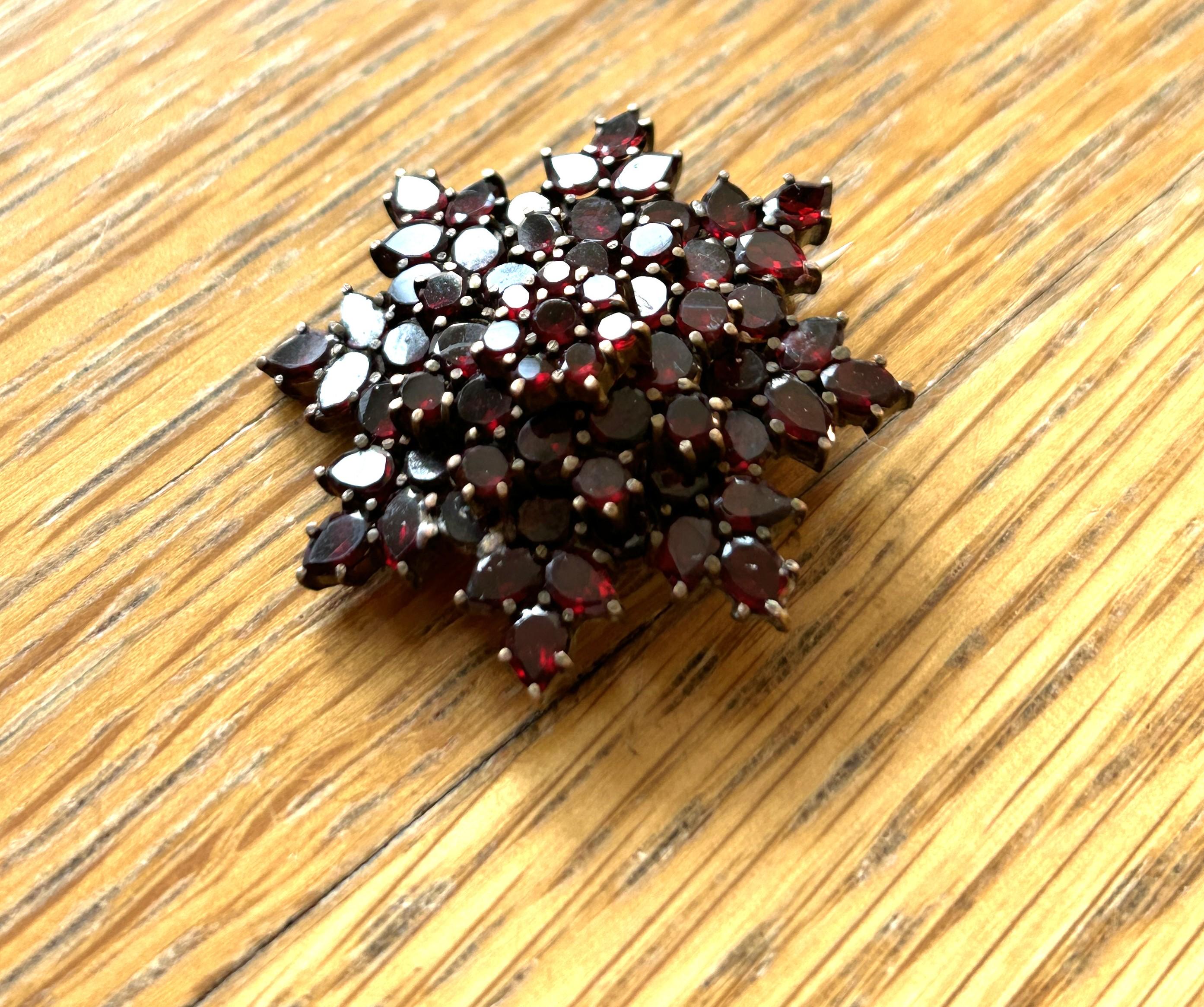 Antique Bohemian real garnet brooch diamond star surrounded by garnets in layers  Gold  1 1/4" diameter Gold 102