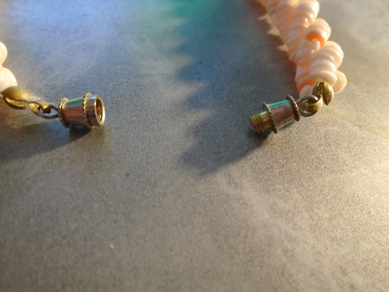 Twisted and nothing missing 1 1950s pale peach angel skin coral necklace Stunning and in great condition 16 dia ref 6304