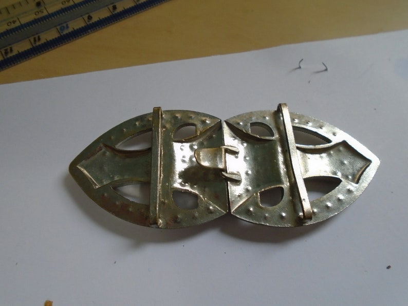 1 art deco buckle with white pastes set in chrome Back to back half tear drop shape 1920s 3 14 X 1 38 ref 9021