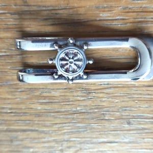 Antique silver money clip with Ships wheel. 1 /8&quot; X 5/8&quot; . Signed Bondi and 925 An ideal gift for him or her.  Collatables 11
