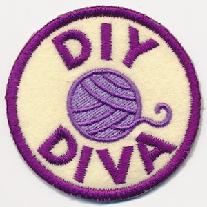 May include: Purple and white embroidered patch with the text "DIY DIVA" and a purple yarn ball with a tail.