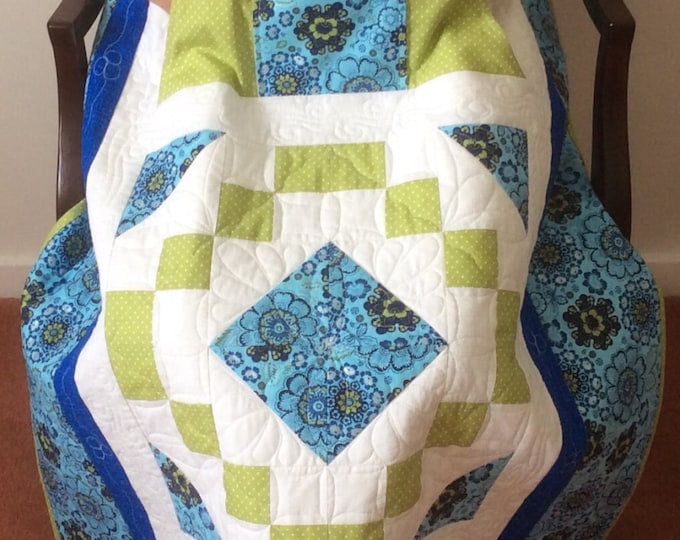 Lap Quilt with Pockets.