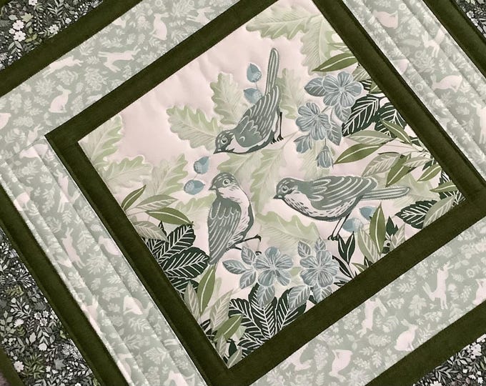 Quilted table topper. Folk style table topper. Green table topper. Wall hanging.