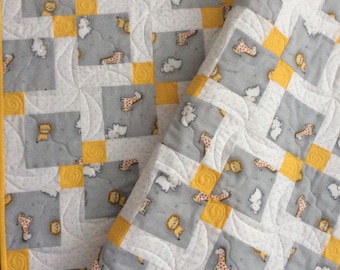 Handmade baby quilt. Disappearing Nine Patch baby quilt.