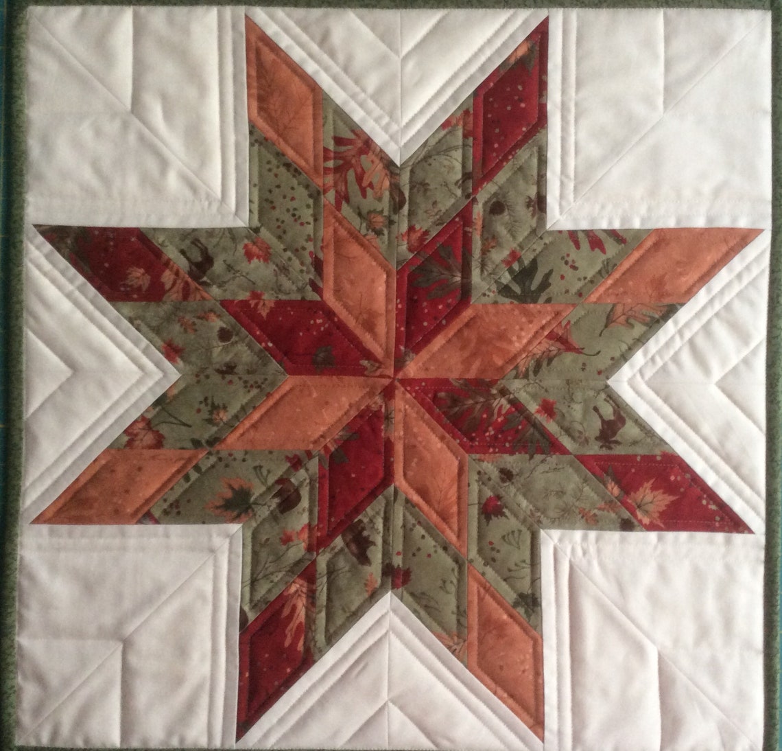 Autumn Star Quilted Table Topper NCU0NNT1130