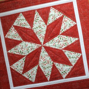 Holiday Starburst Quilted Table Topper NCU0NXD228