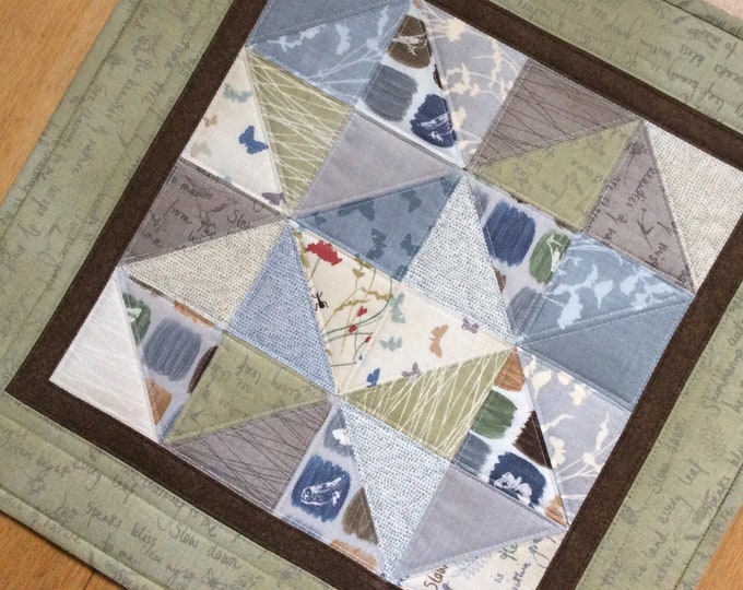 Handmade quilted Table Topper.