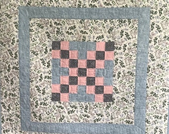 Handmade bunnies baby quilt.