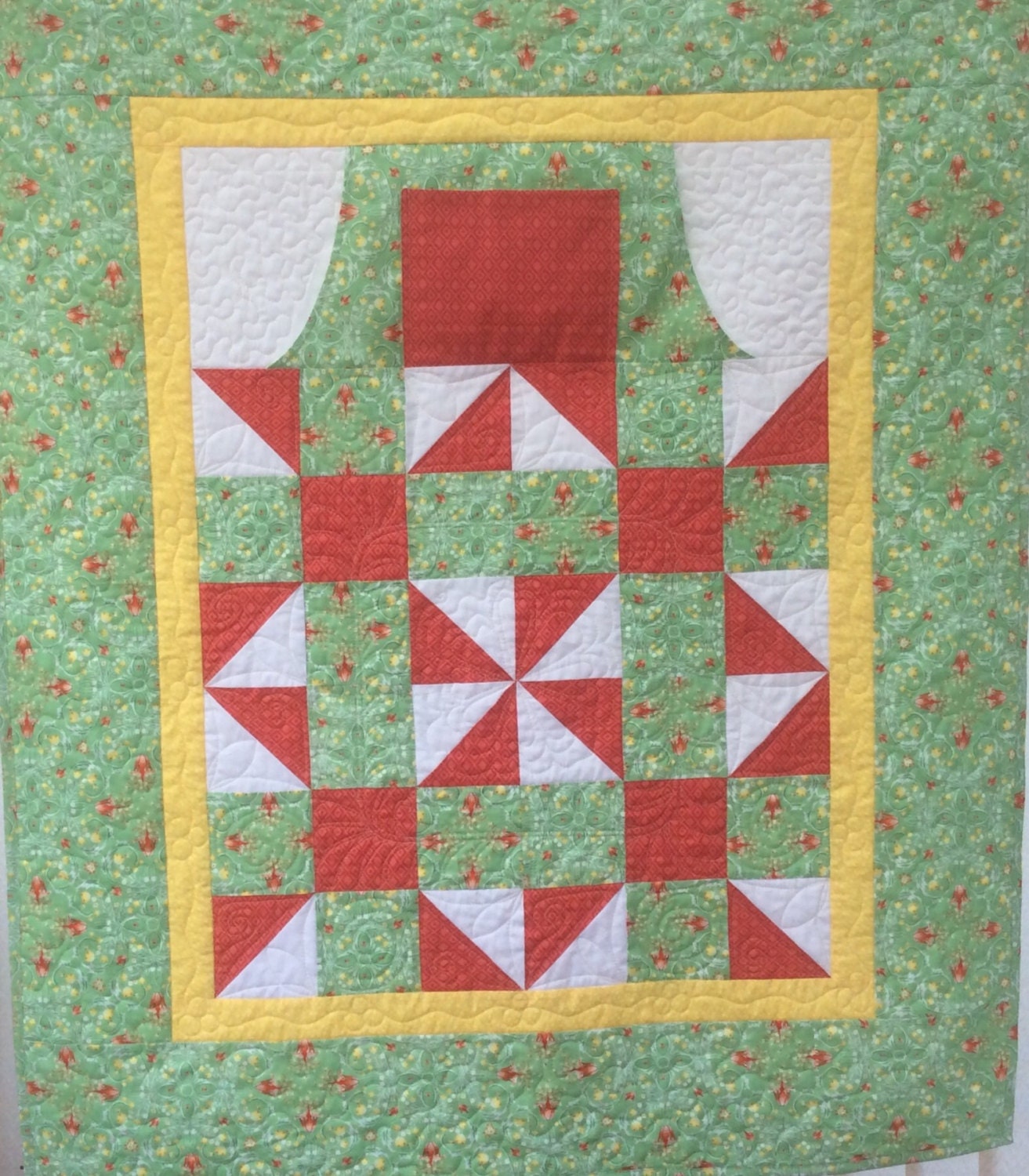 Lap quilt with pockets.