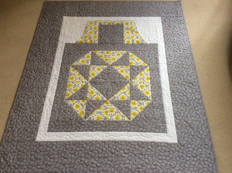 Lap Quilt with Pockets.