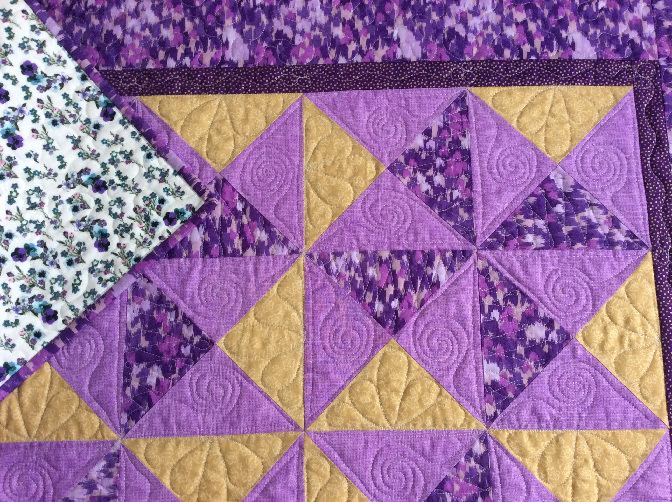 Lap quilt with pockets.