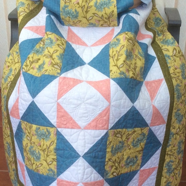 Lap quilt with pockets.