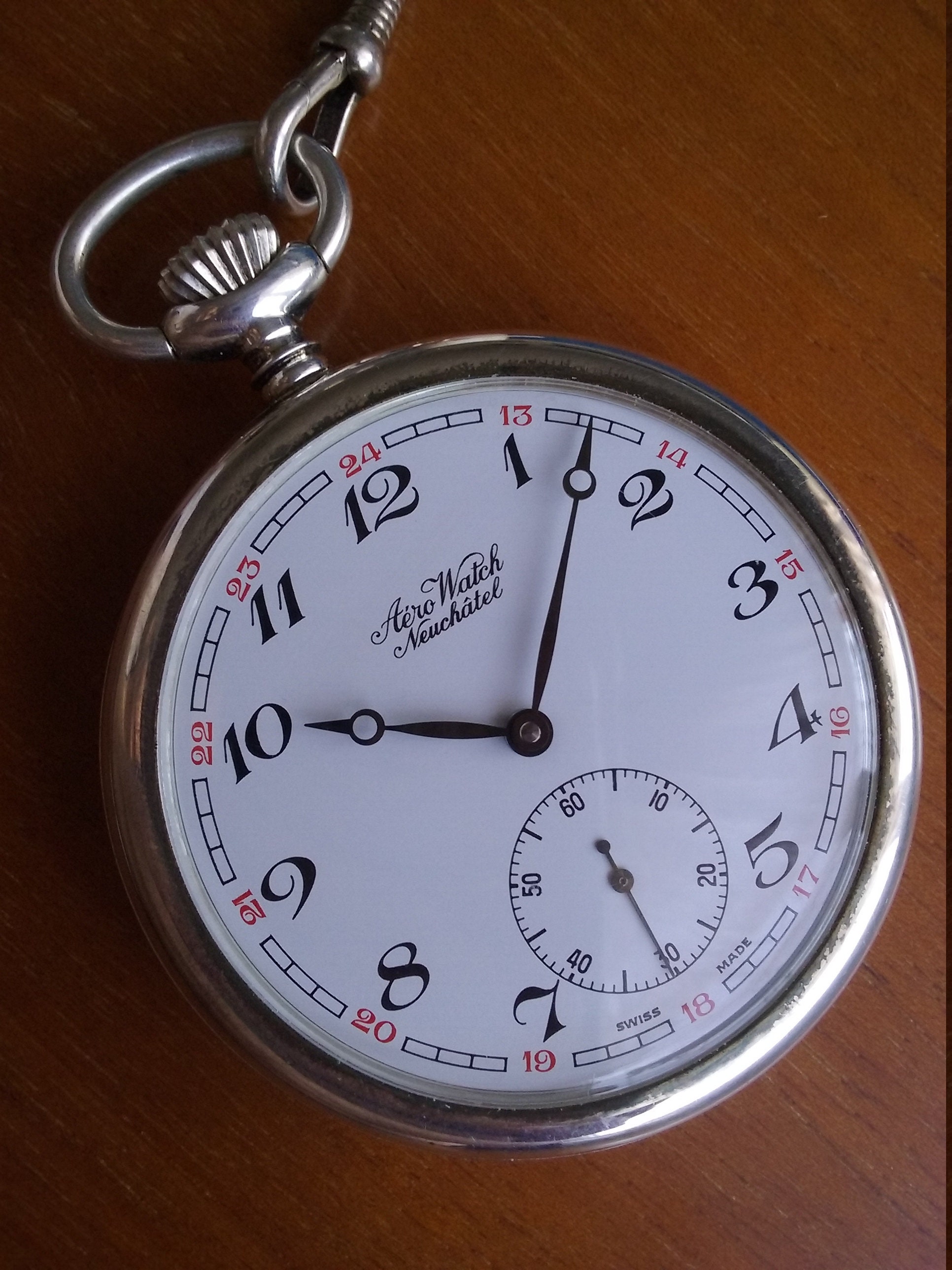 At Auction: Neuchatel State Stamped Key Wind/Set pocket Watch with 18kt  Gold Case