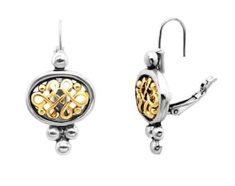 May include: A pair of silver and gold earrings with a delicate, intricate design. The earrings feature a small, oval-shaped pendant with a gold knot design and a cluster of silver beads.