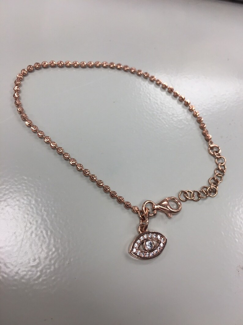Petite Diamond Evil Eye Pendant in 14k Gold