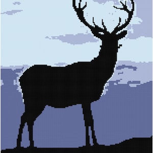 May include: Silhouette of a deer with large antlers standing in a field against a blue and purple cloudy sky.