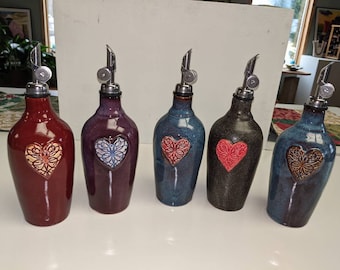 Handmade Heart medallion Oil or Vinegar Pottery Jars, in Seagrove NC